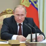 2014-12-04T094906Z_1007110001_LYNXNPEAB30CE_RTROPTP_2_OESTP-RUSIA-PUTIN