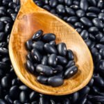 Black Beans In Wooden Spoon